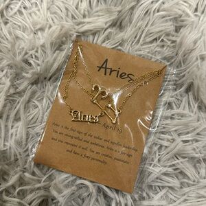 NWT Aries Pack of three zodiac sign necklace